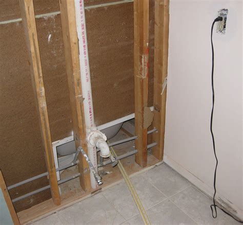 electrical wire behind shower tile